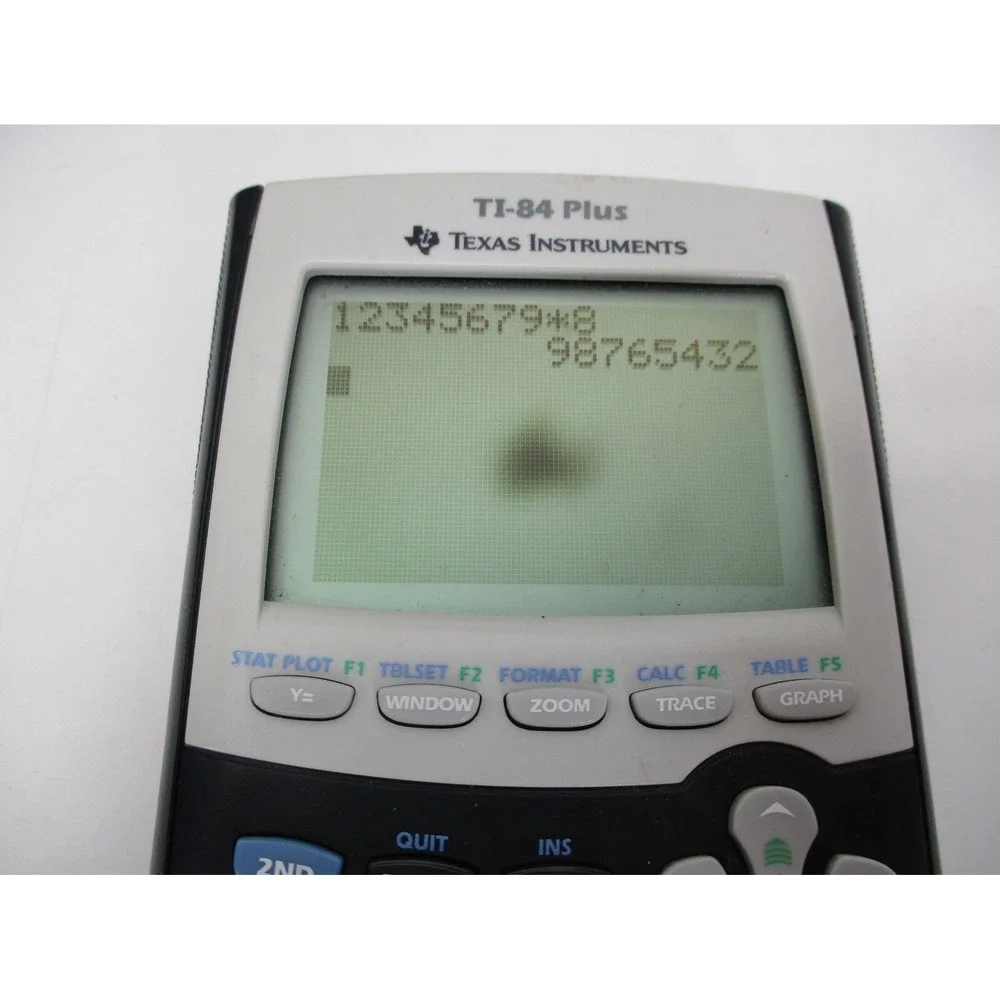 Texas Instruments Ti-84 Plus Graphing Calculator no battery cover Works